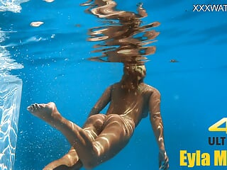 Eyla Moore, A Famous Model, Glides Elegantly Through The Water free video